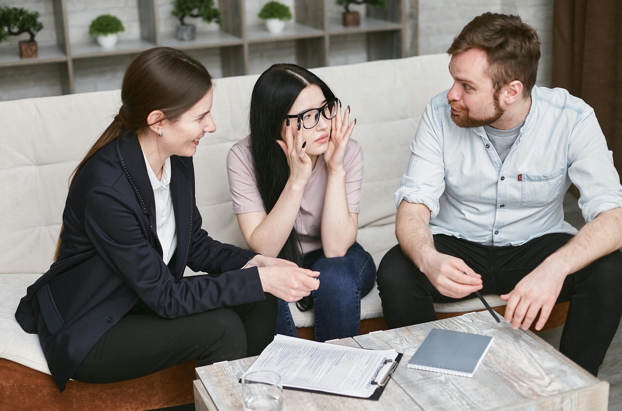 People looking stressed whilst searching for their insurance policy