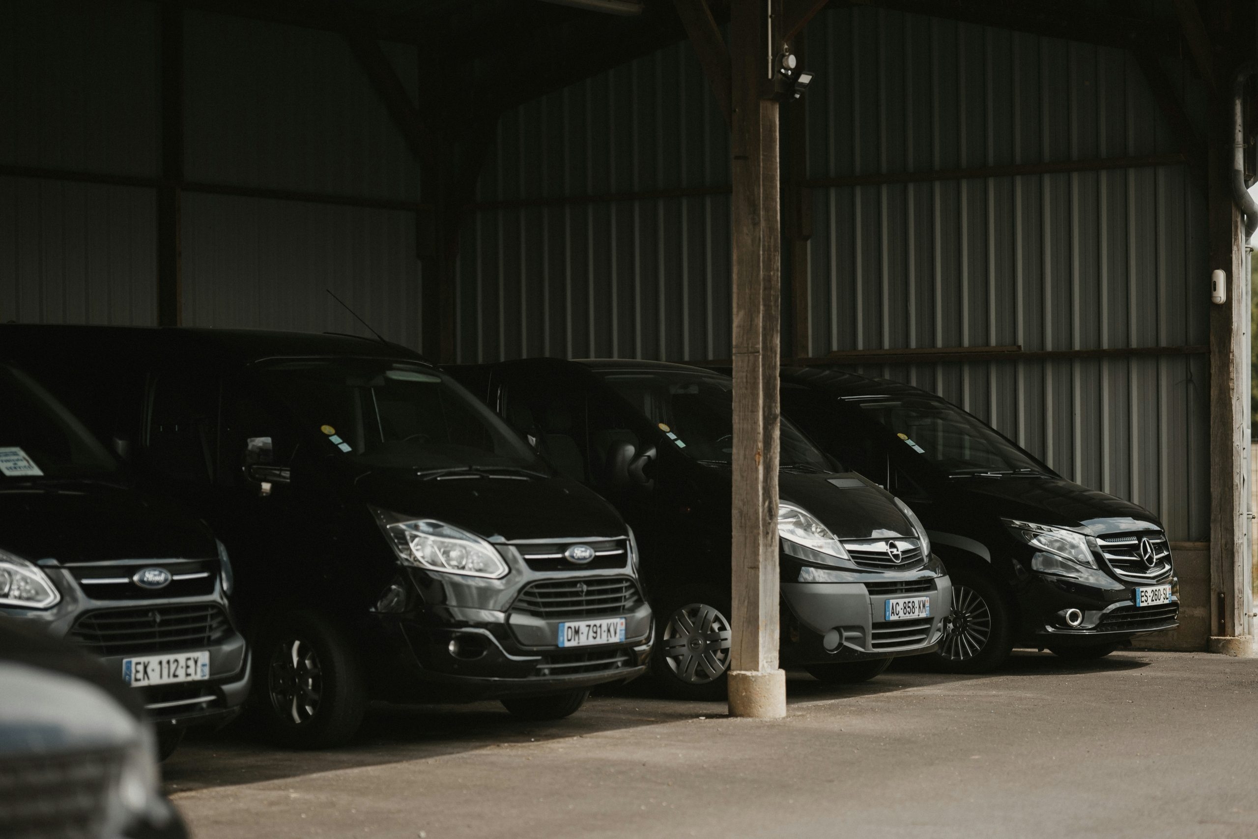 Fleet of black vehicles